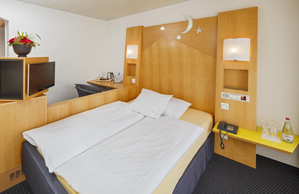 Stella Swiss Quality Hotel Интерлакен Номер фото