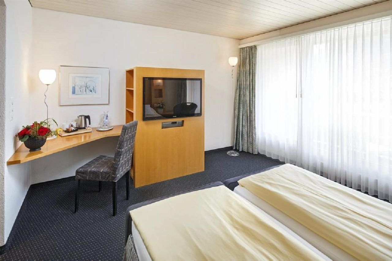 Stella Swiss Quality Hotel Интерлакен Номер фото